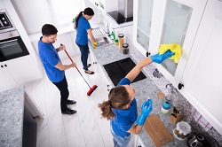 Professional cleaners providing Recurring House Cleaning Services in Cary NC for spotless kitchens and organized homes.